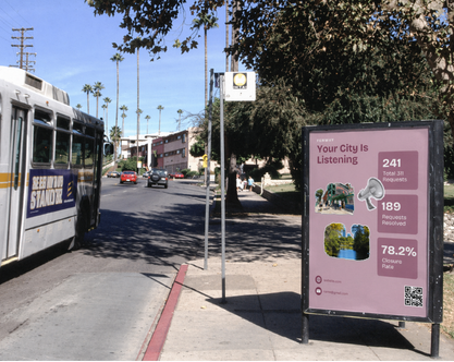 Fenway poster reading 'Your City Is Listening' mocked up on a bus-shelter ad panel